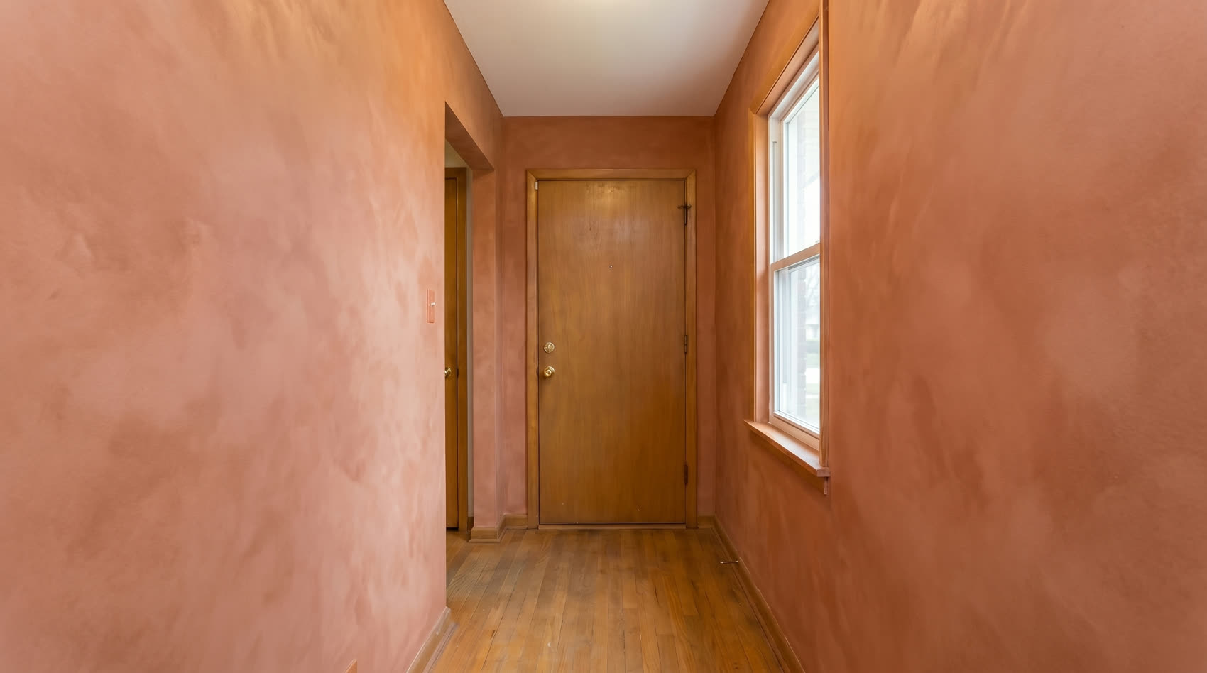 Terracotta limewash entryway